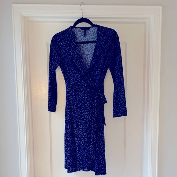 BCBGMaxAzria Dresses & Skirts - BCBGMaxAzria Wrap Dress in Leopard Print